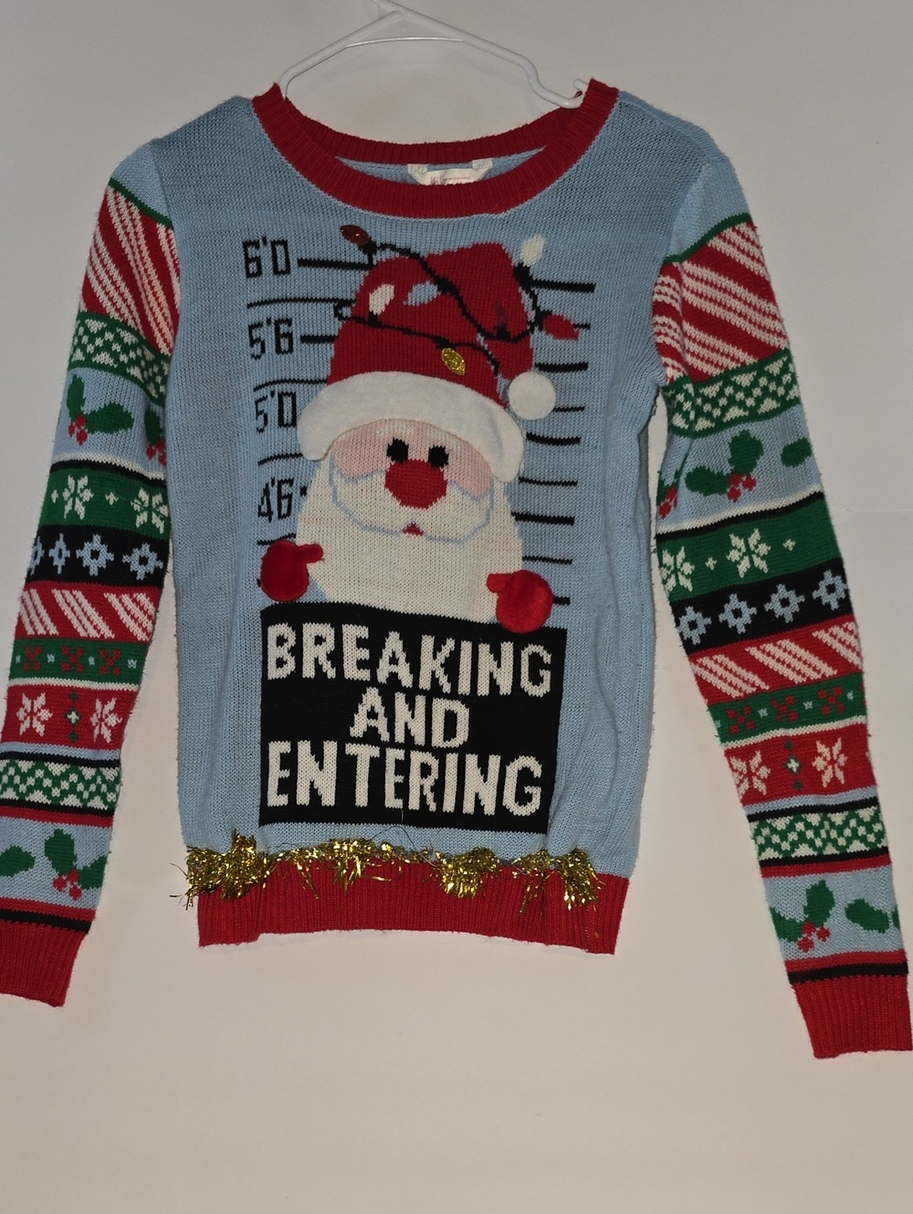 No Boundaries Light Blue Santa Mugshot Sweater with Red and Green Accents #28